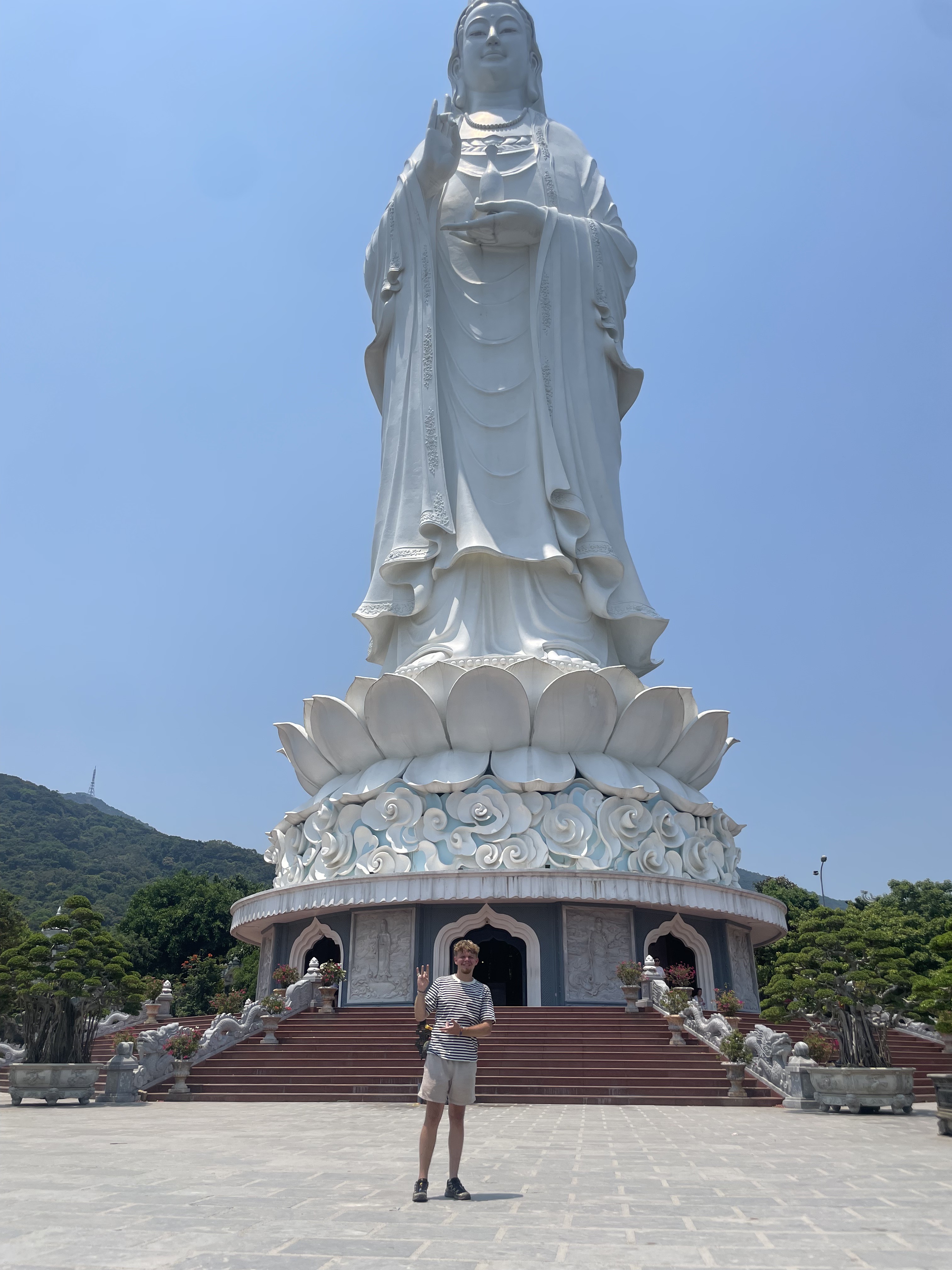 In front of the Lady Buddha statue in Da Nang, Vietnam